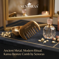 Senoras Bronze Kansa Comb on natural linen with dried botanicals – authentic Ayurvedic hair care tool